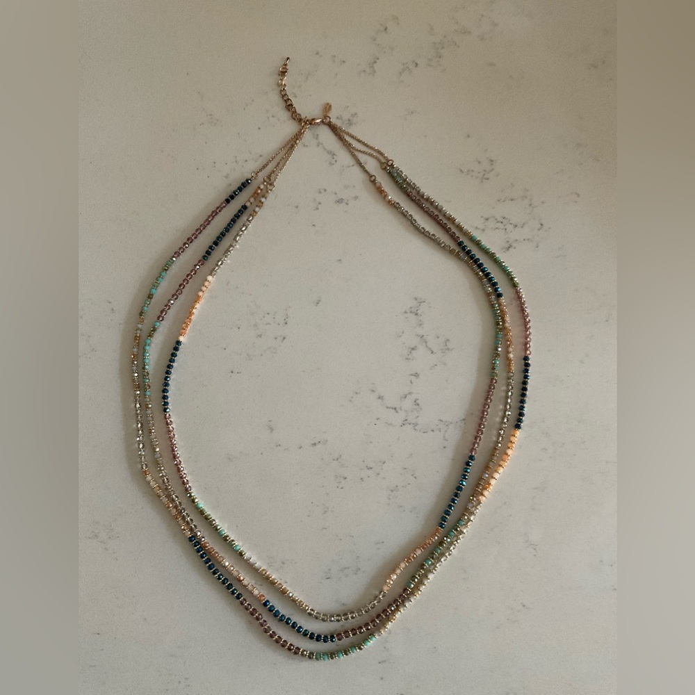 Gold Tone Triple Strand Necklace with Glass Faceted Beads